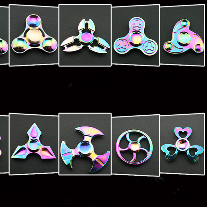 Métallique en alliage de zinc Dazzle couleur tourner à la main toupie Spinner top peg-top