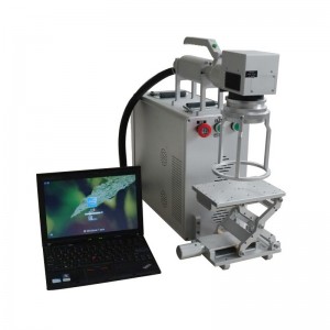 Machine de gravure sur fibre tenue dans la main