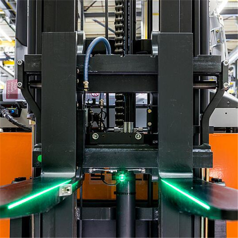 Système de guidage laser pour chariot élévateur pour entrepôt de manutention de marchandises