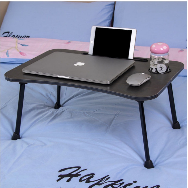 Table pliante sur lit d'ordinateur