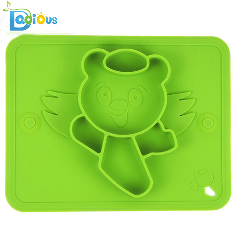 Une plaque d'alimentation en silicone pour bébé avec napperon en silicone mono-pièce avec logo convient aux plateaux pour chaises hautes