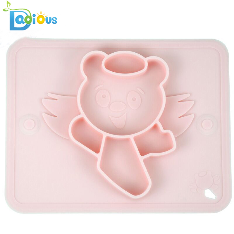 Une plaque d'alimentation en silicone pour bébé avec napperon en silicone mono-pièce avec logo convient aux plateaux pour chaises hautes