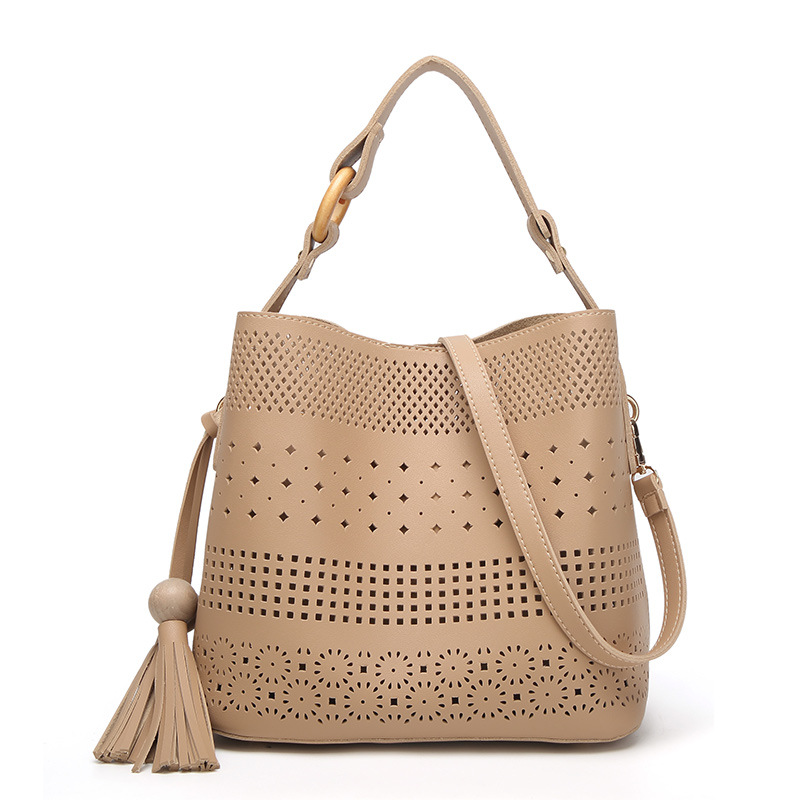 HD0827 - Vente en gros d'un sac à bandoulière en cuir creux pour femmes, Shopping