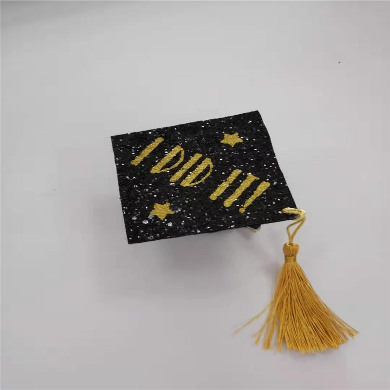 Chapeau de graduation noir et blanc avec gland glitter pour la fête