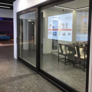 Porte coulissante en verre