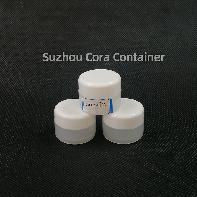 Bouteille de maquillage en plastique avec couvercle rotatif