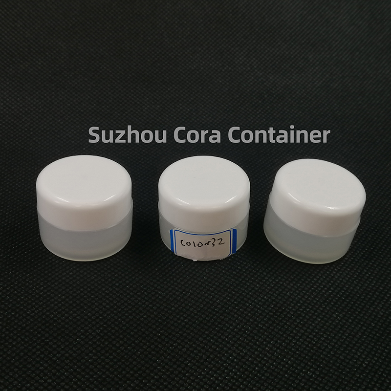 Bouteille de maquillage en plastique avec couvercle rotatif