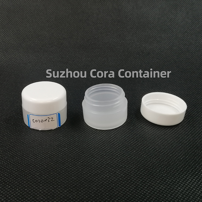 Bouteille de maquillage en plastique avec couvercle rotatif