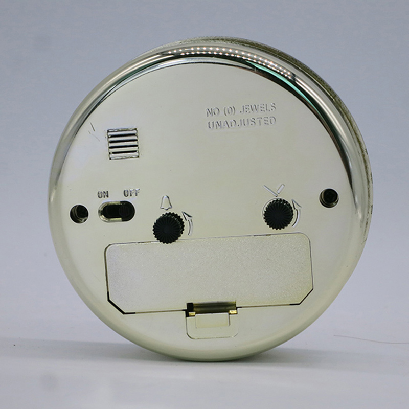 Interrupteur de réveil doré de 89 mm de diamètre