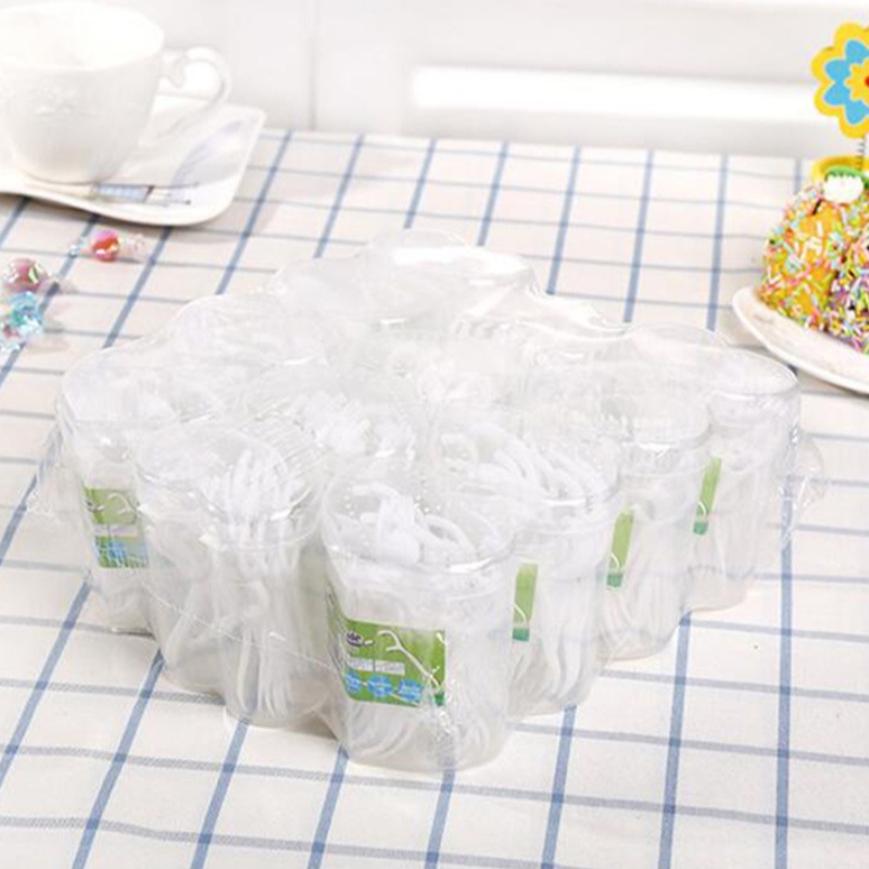 50 PCS Emballage Coeur en forme de coeur OEM jetable Wholesalenaturelle bon marché Sticks de fil dentaire Emballage Dentaire Dentaire