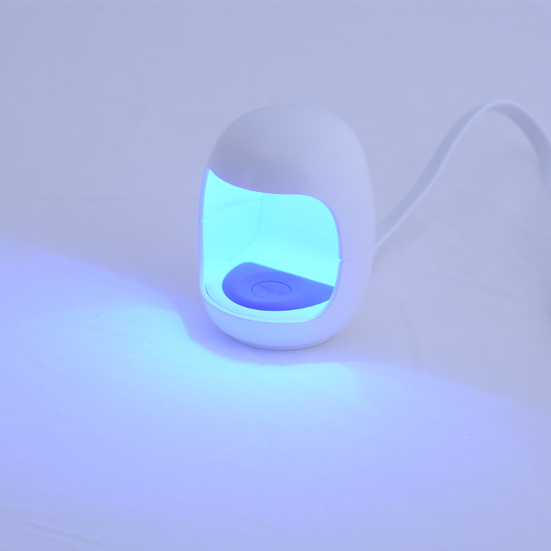 Mini lampe à ongles à doigt unique QQ1
