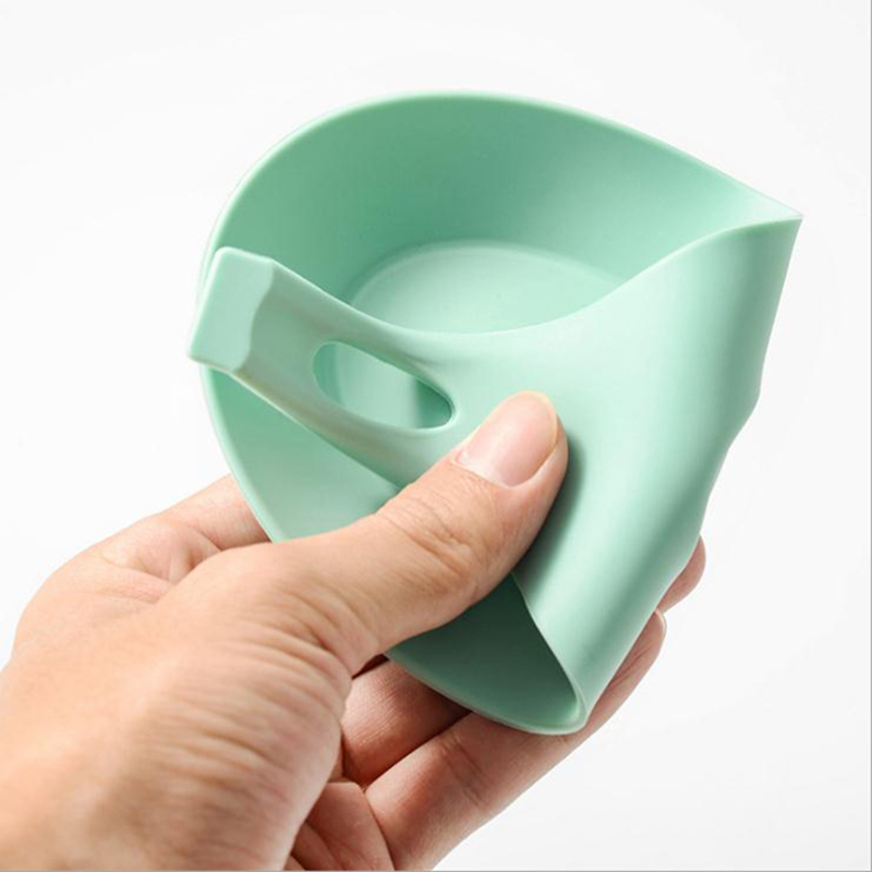 Gardin de cuisine en gros de la chaleur porte-cuillère de forme d'amande de forme d'amande la louche à la cuillère en silicone repos