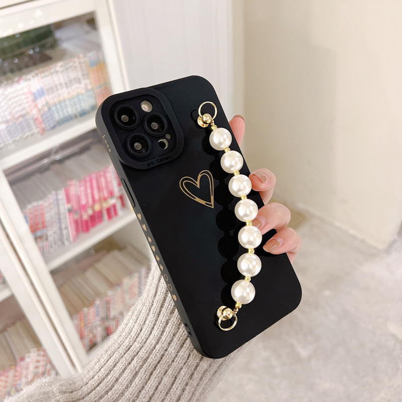 Lenouveau produit est applicable à l'Apple iPhone14Pro Pearl Bracelet Protective Case, et l'objectif est entièrement protégé et mis àniveau