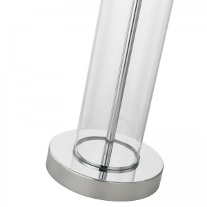 Lampe de table en verre transparent avec finition chromée polie à l\'hôtel chambre