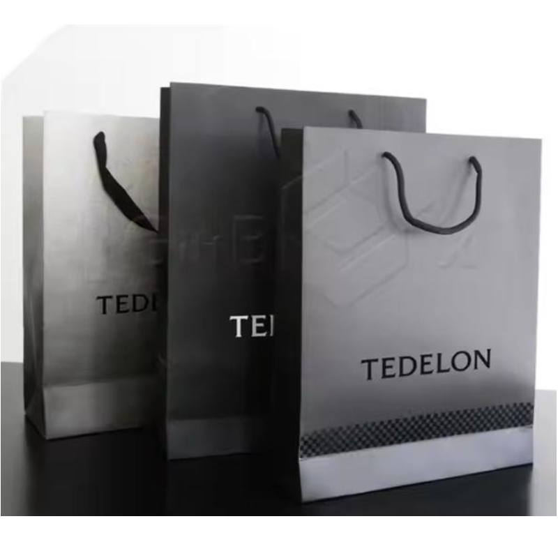 Sac en papier d'emballage cadeau de magasinage à imprimé sur mesure de luxe avec votre propre logo